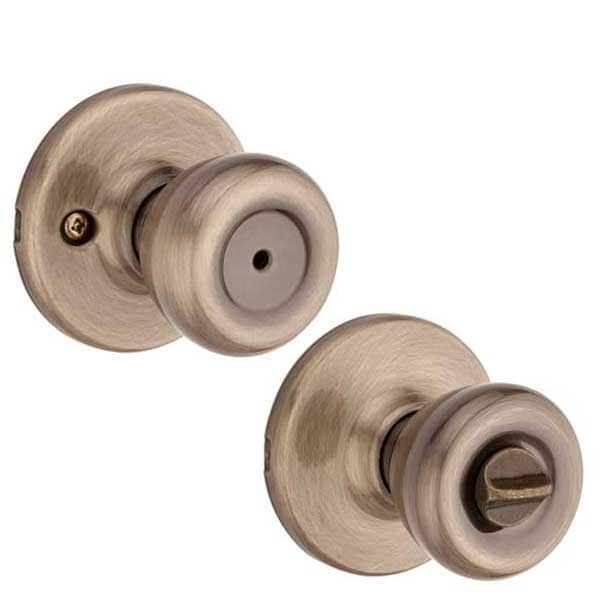 Kwikset: Tylo Privecy Door Knob with Round Rose / Antique Brass